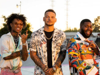 Kane Brown takes Khalid and Swae Lee for a retro ride in neon-soaked “Be Like That” video