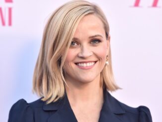 Reese Witherspoon says she was “terrified” to become a mom at 22