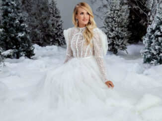 Carrie Underwood dons a mask to buy her own album at Target