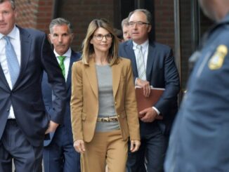 Lori Loughlin reports to prison to serve two months for college admissions scheme