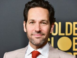 Paul Rudd brings cookies to voters waiting outside in the rain