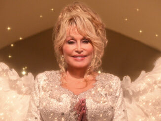 Dolly Parton plays a singing angel in her upcoming Netflix holiday special, ‘Christmas on the Square’