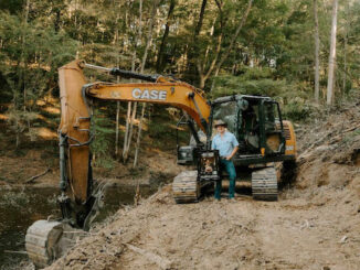 Jon Pardi gets surprised with platinum “Heartache Medication” while in “work mode” on his farm