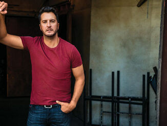 Luke Bryan spotlights a blooming relationship in “Down to One” video