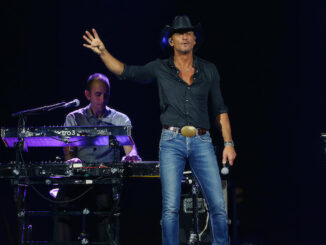 Tim McGraw has been named godfather to Emma Roberts and Garrett Hedlund’s son, Rhodes